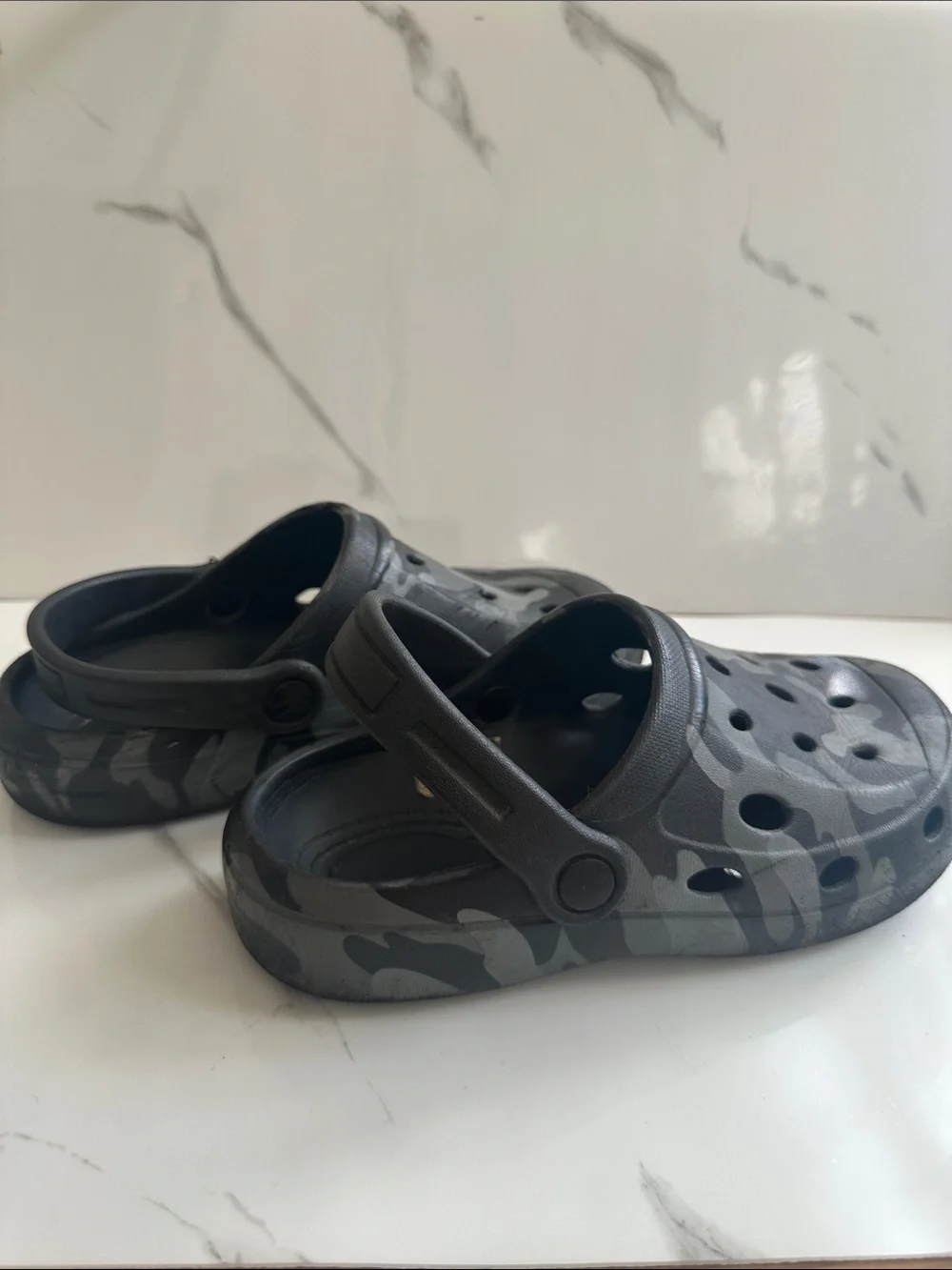 CROCS USED but still Good (has a hole but will be patched)